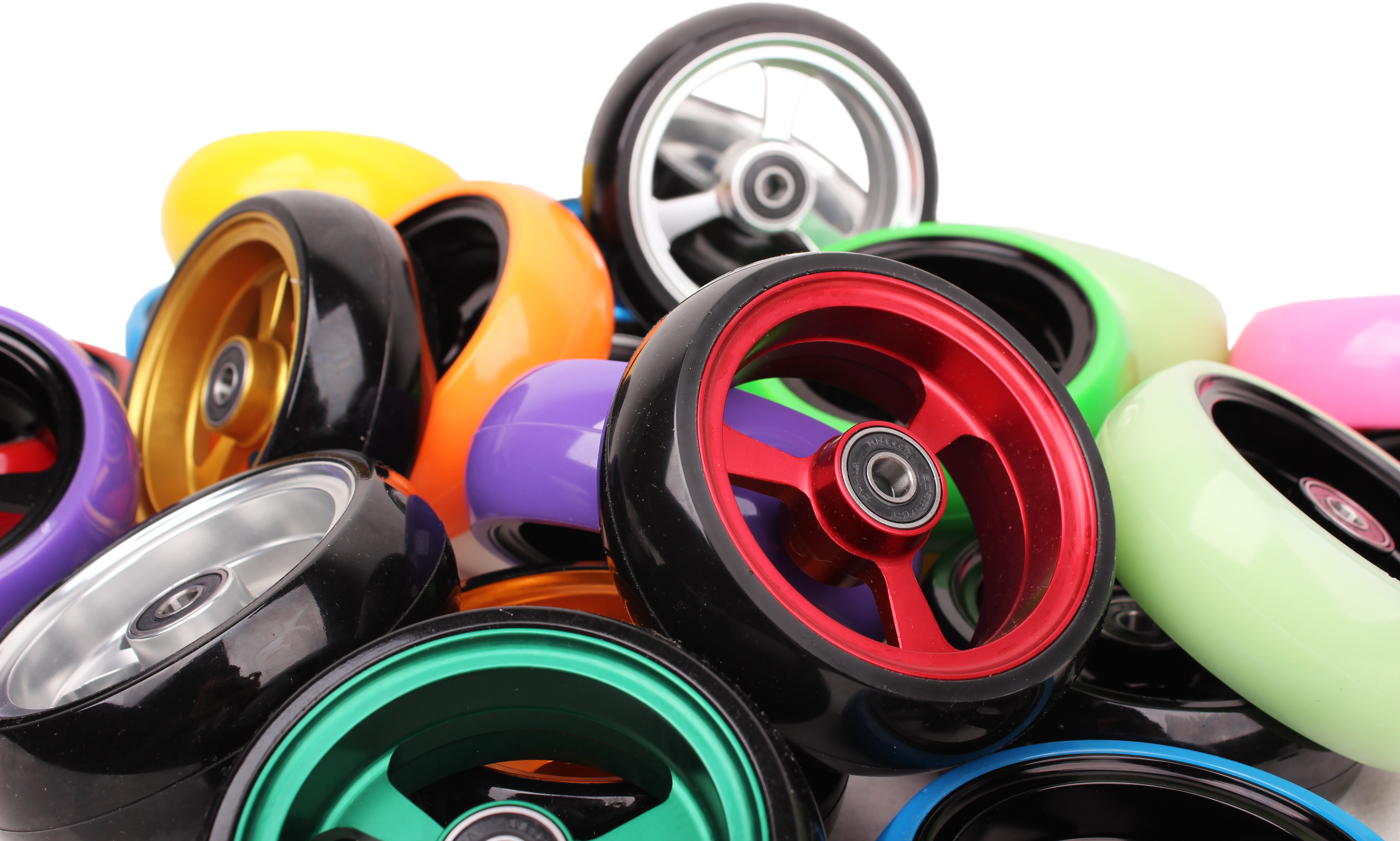 Pile of different colored caster wheels.